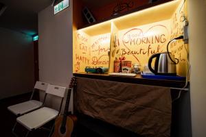 Fotografie z fotogalerie ubytování Love River Inn 愛河日央 v destinaci Kao-siung