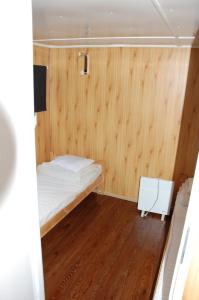 Łóżko lub łóżka w pokoju w obiekcie Ośrodek Wypoczynkowy ADA