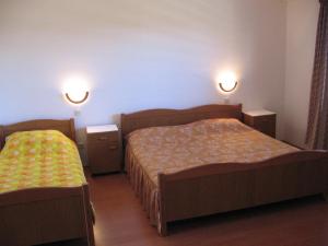 Ein Bett oder Betten in einem Zimmer der Unterkunft Guest House Caterina