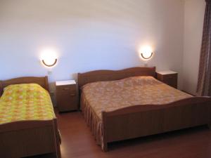 Postel nebo postele na pokoji v ubytování Guest House Caterina