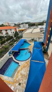 Vista de la piscina de Apartamento Thermas das Caldas Residencial o alrededores