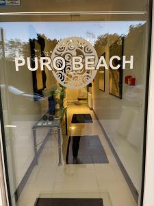 a store window with the word probeach on it at Residence Puro Beach - Adults only in Międzyzdroje