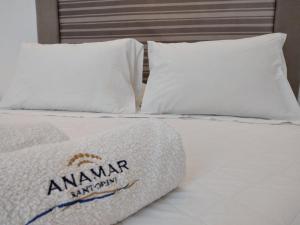 Letto o letti in una camera di Anamar Santorini