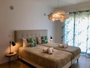 Кровать или кровати в номере Âncora Boutique Apartments