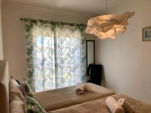 Кровать или кровати в номере Âncora Boutique Apartments