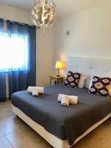 Кровать или кровати в номере Âncora Boutique Apartments
