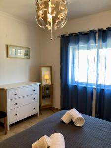 Кровать или кровати в номере Âncora Boutique Apartments