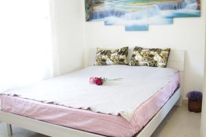 Una cama o camas en una habitación de Villa Chiara Affitta Camere
