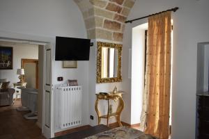 TV a/nebo společenská místnost v ubytování B&B Prestige