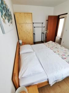 Posteľ alebo postele v izbe v ubytovaní Apartment Hramina