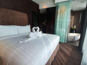 
Un ou plusieurs lits dans un hébergement de l'établissement The Canvas Dubai - MGallery Hotel Collection
