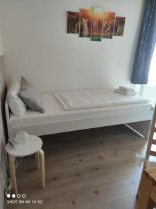 A bed or beds in a room at Berliner Ecke