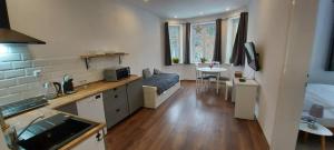Kuchyň nebo kuchyňský kout v ubytování Ubytování v soukromí - Apartmán MERAN