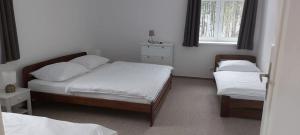 Postel nebo postele na pokoji v ubytování Ubytování v soukromí - Apartmán MERAN