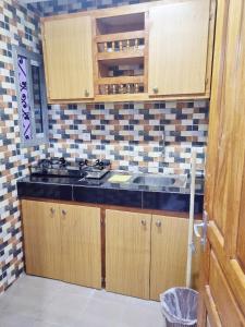 מטבח או מטבחון ב-Residence Sighaka - Gold Apartment - WiFi, Gardien, Parking