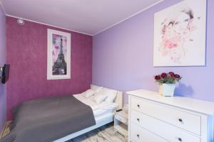 Posteľ alebo postele v izbe v ubytovaní Apartamenty Barakuda