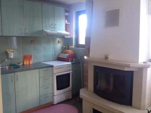 Kuchyňa alebo kuchynka v ubytovaní Guest rooms Dyado Sabcho