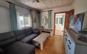 Et tv og/eller underholdning på Villa Rosa Ferienhaus Costa Blanca La Marina San Fulgencio Alicante