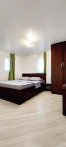 Postel nebo postele na pokoji v ubytování Casa ELENIS