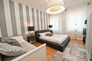 Postel nebo postele na pokoji v ubytování Verona Maison