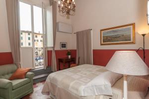 Posteľ alebo postele v izbe v ubytovaní B&B Arena di Lucca