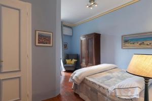 Posteľ alebo postele v izbe v ubytovaní B&B Arena di Lucca