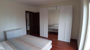 Posteľ alebo postele v izbe v ubytovaní ArmacHouse - Appartamenti sul mare