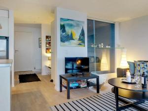 TV a/nebo společenská místnost v ubytování Holiday home Hadsund LXV