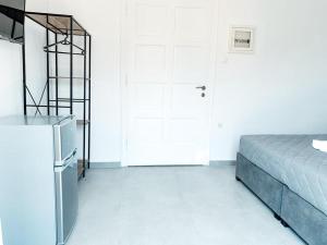 Cama ou camas em um quarto em Fabrica Sunset Apartments
