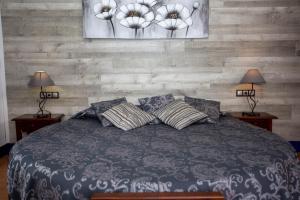Ein Bett oder Betten in einem Zimmer der Unterkunft Caserio de Iznájar