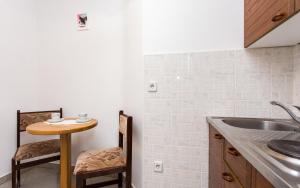 Kuchyň nebo kuchyňský kout v ubytování Apartman Justinić