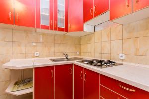 Kuchyňa alebo kuchynka v ubytovaní Apartman Justinić + 37 fotografií