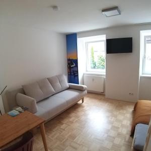 Posezení v ubytování Convenient and Functional Apartment in the Center