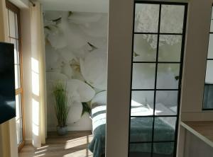 Łóżko lub łóżka w pokoju w obiekcie Apartament nad Łomnicą