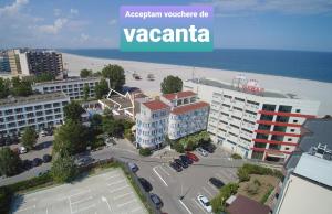 an aerial view of a city with a beach and buildings at BRIZA Boutique Hotel Mamaia in Mamaia