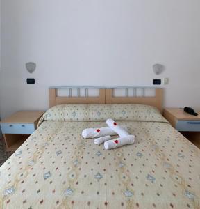 Postel nebo postele na pokoji v ubytování Hotel Del Vecchio