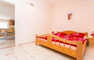 Łóżko lub łóżka w pokoju w obiekcie Apartmani Andreas