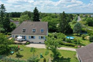 an aerial view of a house with a swimming pool at Chez Lucie en Touraine in Montlouis-sur-Loire