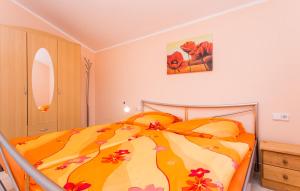 Łóżko lub łóżka w pokoju w obiekcie Apartmani Andreas