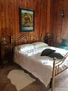 Uma cama ou camas num quarto em L'Orsa