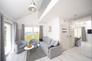 TV a/nebo společenská místnost v ubytování Porta Mare Apartments LuxView III