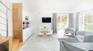 TV a/nebo společenská místnost v ubytování Porta Mare Apartments LuxView III