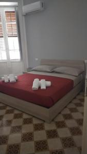 Cama o camas de una habitación en Gran Tour Profumo di Sicilia - B & B