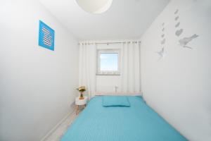 Postel nebo postele na pokoji v ubytování Porta Mare Apartments LuxView III