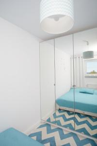 Postel nebo postele na pokoji v ubytování Porta Mare Apartments LuxView III
