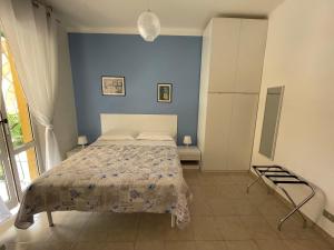 Postel nebo postele na pokoji v ubytování Casa Rosetta Affittacamere