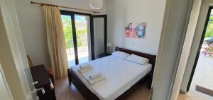 Llit o llits en una habitació de Sivota Apartments