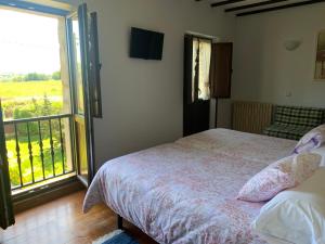 Postel nebo postele na pokoji v ubytování Hotel Siglo XVIII