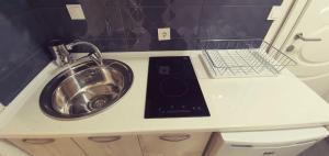 Η κουζίνα ή μικρή κουζίνα στο Apartmani Kaldrma