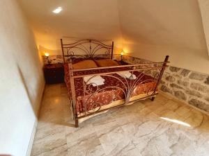 Tempat tidur dalam kamar di Palace Jelena Rooms